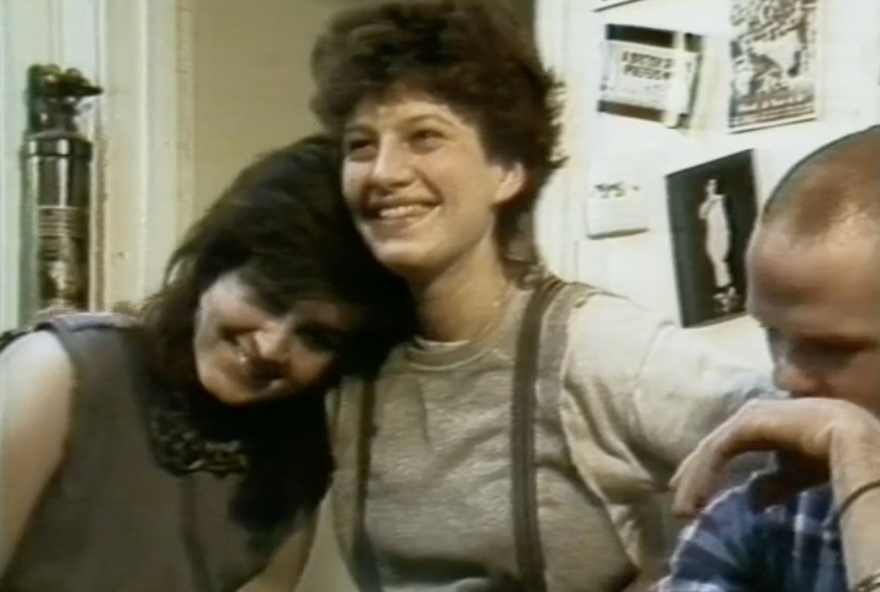 women hugging with jimmy somerville framed youth.